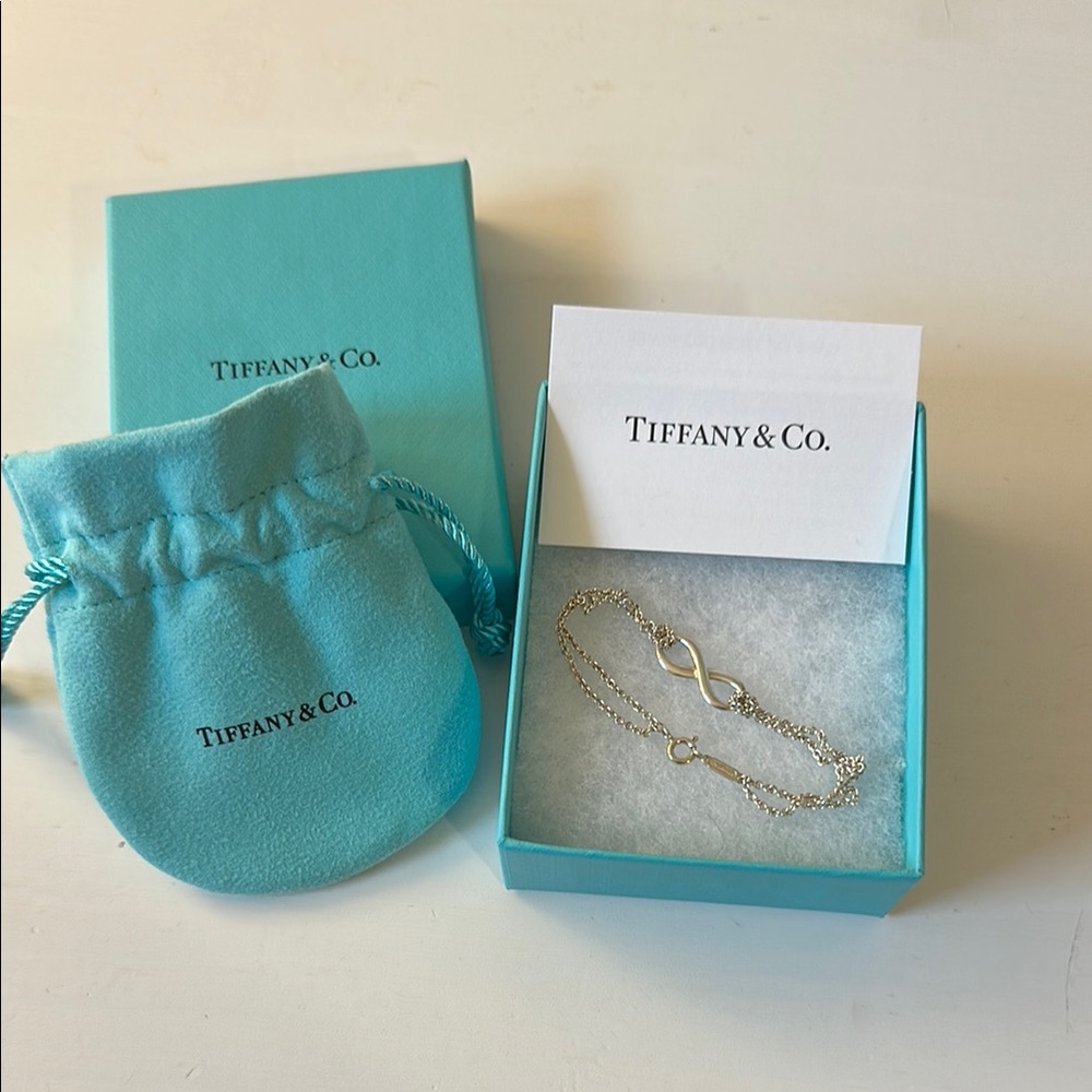 Tiffany & Co. Gold Infinity Bracelet with Tiffany Blue Pouch and Box